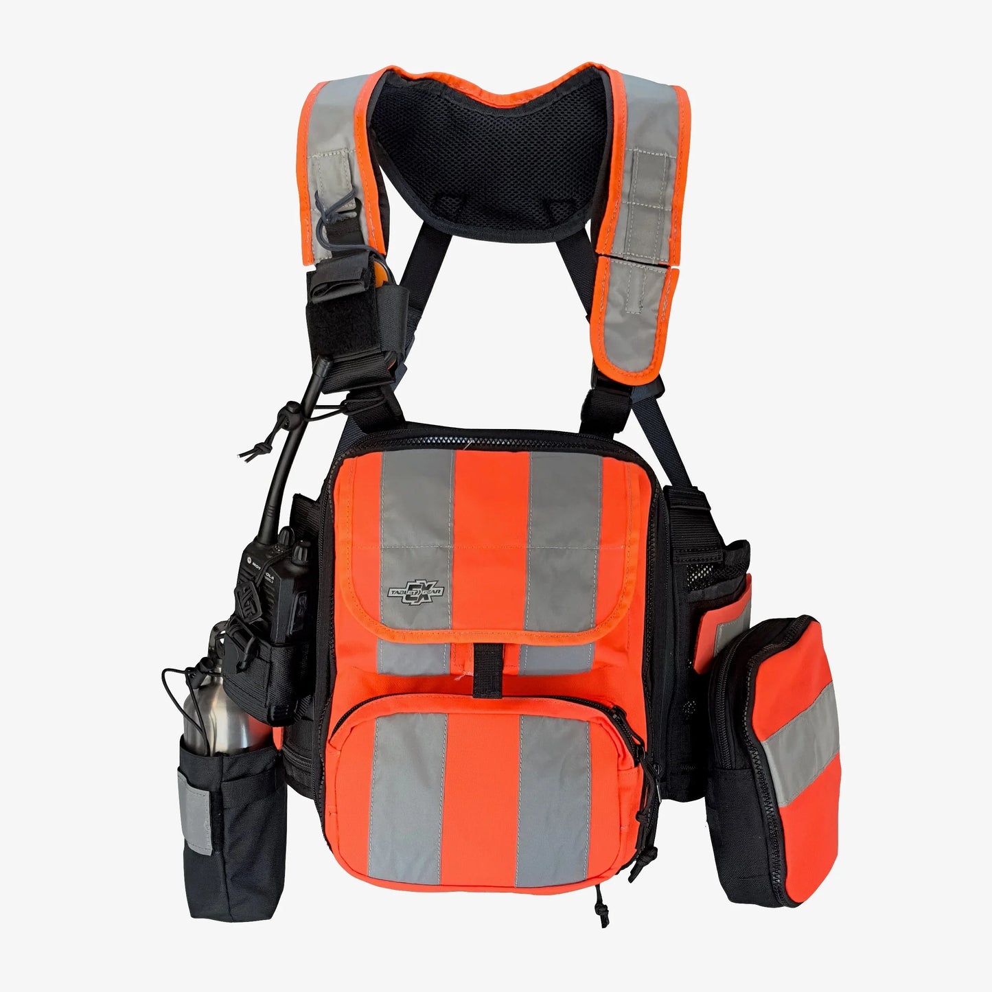 A Tablet EX Gear high-visibility orange Ruxton Pack featuring silver reflective striping, an integrated radio pouch, a water bottle holder, and a modular utility pocket for industrial field safety.